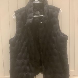 Black North Face puffer vest